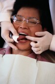 Poor Oral Hygiene Tied to Cancer-Linked Virus, Study Finds